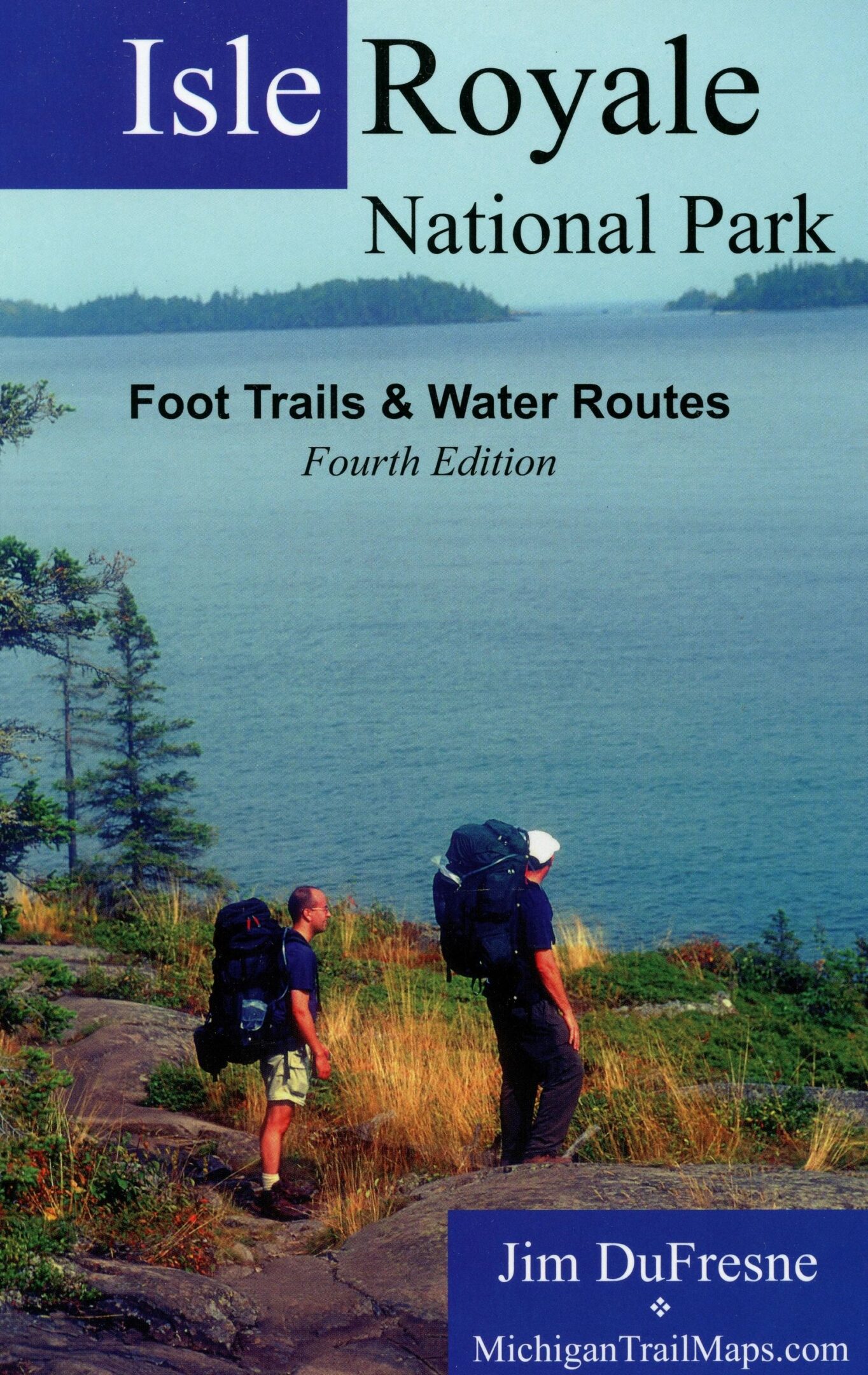 Hikers overlooking lake at Isle Royale.