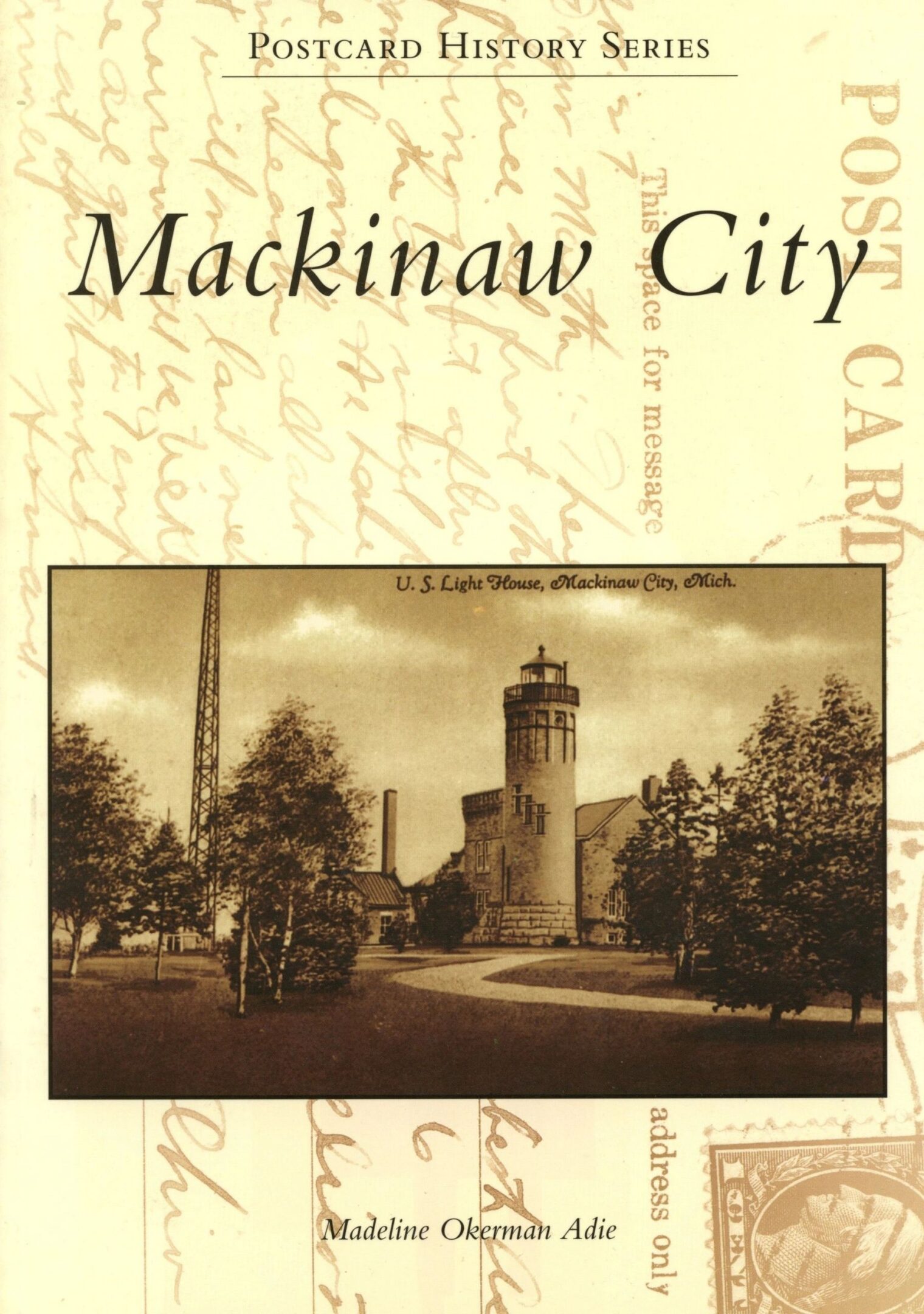 Vintage Mackinaw City postcard with lighthouse.