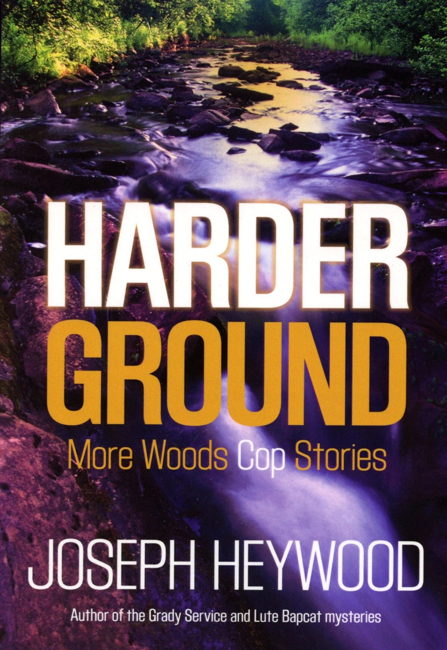 Book cover: "Harder Ground" by Joseph Heywood.