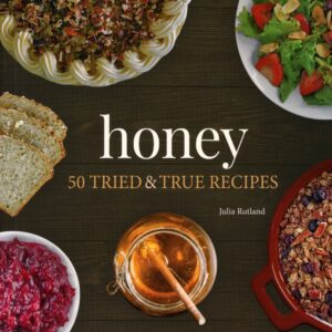 Cookbook cover with honey and various dishes.
