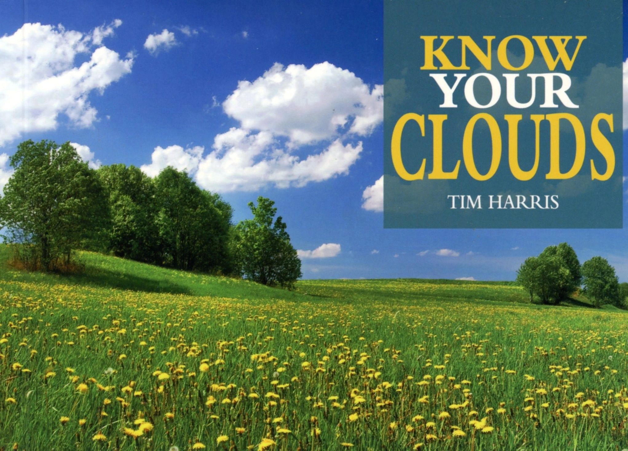Book cover with field and clouds.