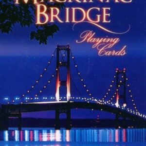 Mackinac Bridge illuminated at night, playing cards.