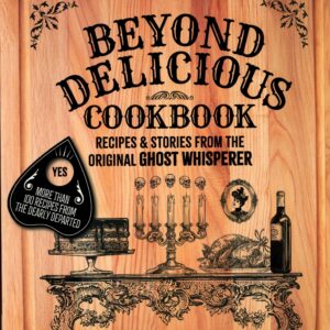 Cookbook cover featuring ornate table design.