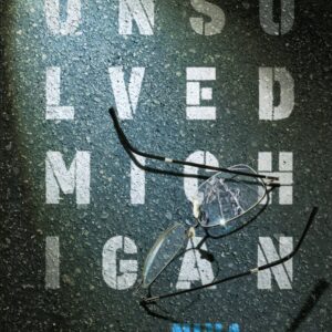 Broken glasses on "Unsolved Michigan" book cover.